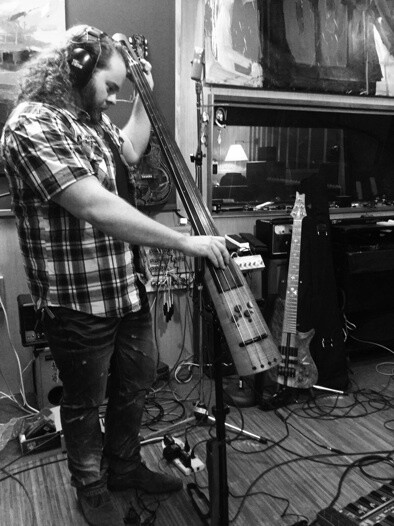 Chance Wilder Onody playing the CRM Upright in studio setting