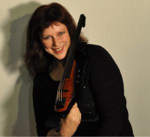 photograph of NS Artist Eductor Julie Lyonn Lieberman with her NXTa violin