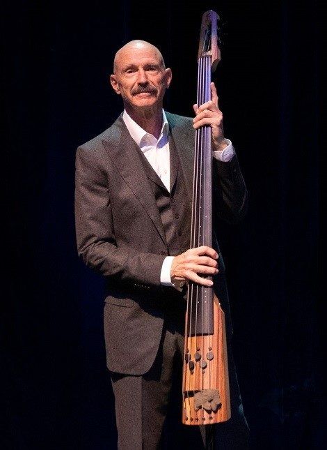 Photograph of NS Design Artist Tony Levin playing his CR5M Electric Upright Bass with King Crimson on their 50th Anniversary Celebration Tour.