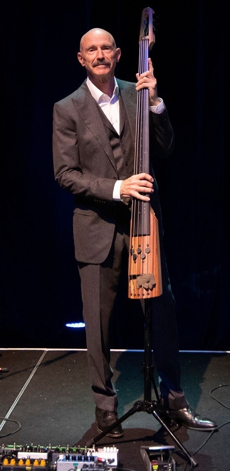 Photograph of NS Design Artist Tony Levin playing his CR5M Electric Upright Bass with King Crimson on their 50th Anniversary Celebration Tour.