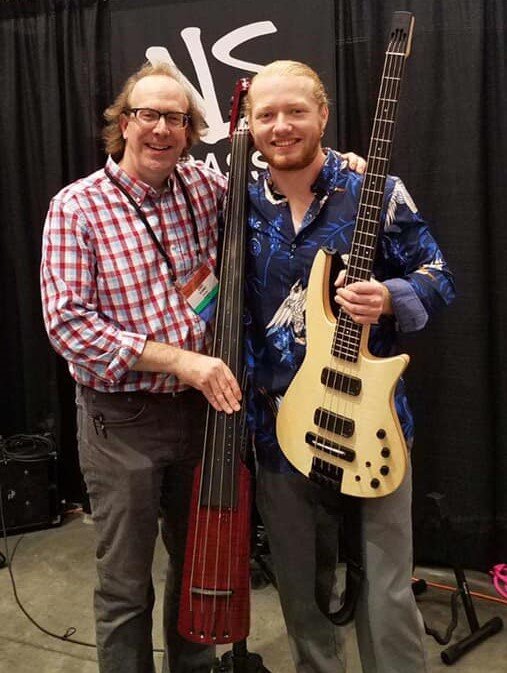 NS Artist Relations Manager Corey Redonnett at the NS Booth at IBMA 2019 with Jake Moore.
