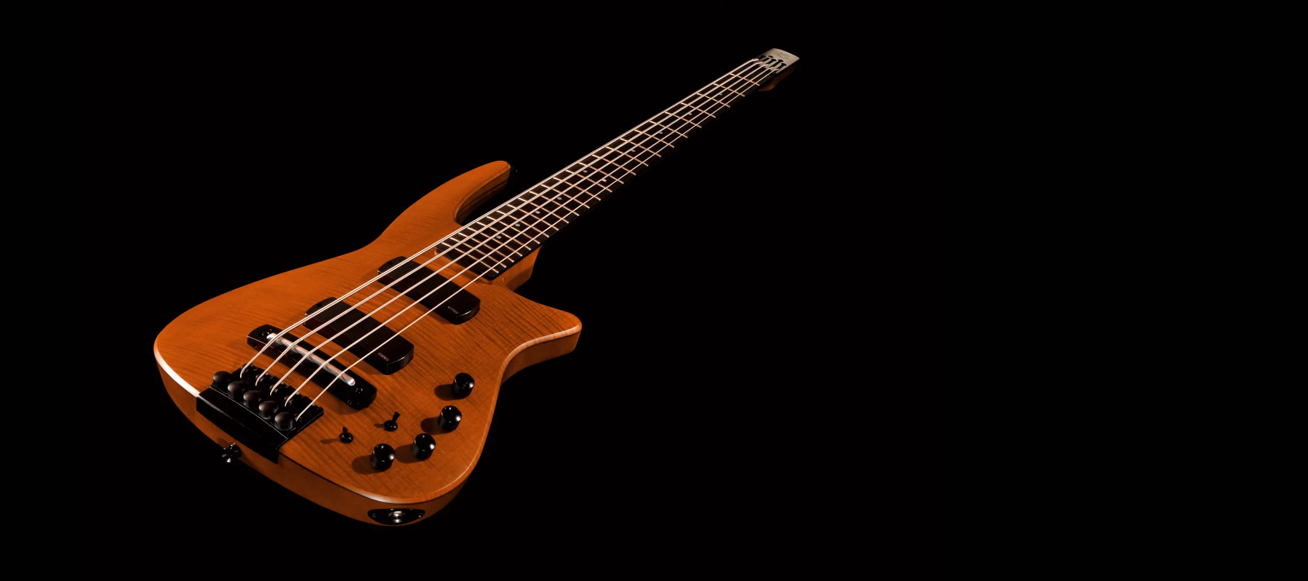 CR Radius Bass Guitar in Amber Satin finish.