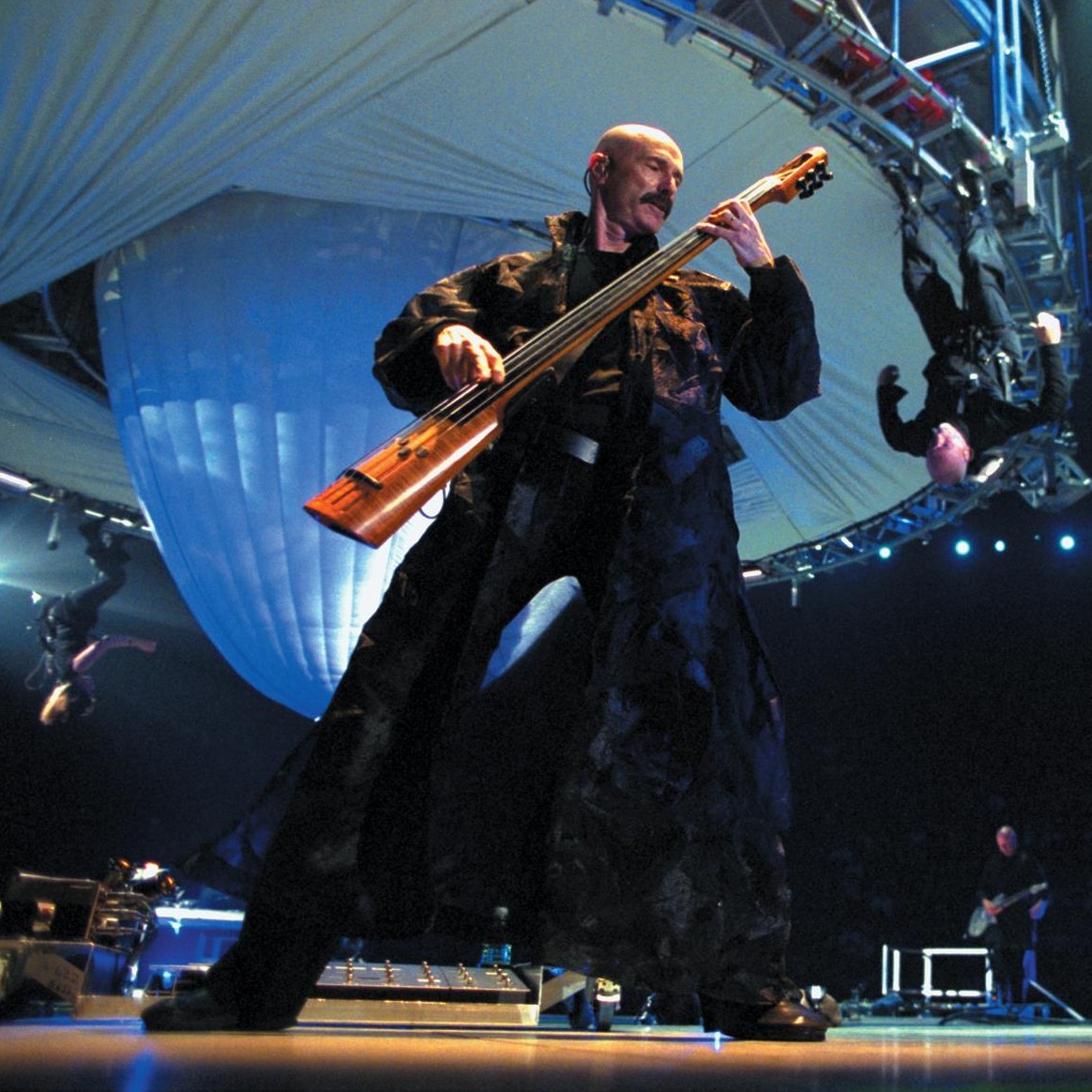 Tony Levin. He bought the first Steinberger bass. He bought the first NS Design electric upright. Here he is in action with Peter Gabriel.
